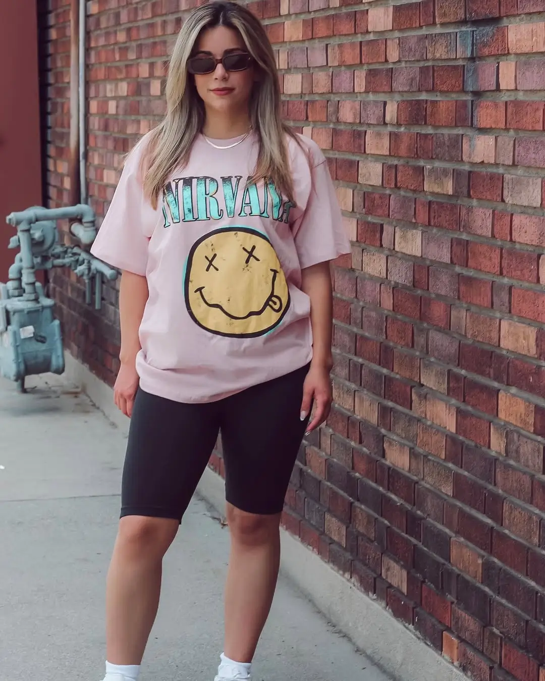 biker shorts outfits summer 2026 Pink Graphic Tee with Black Biker Shorts Street Ease