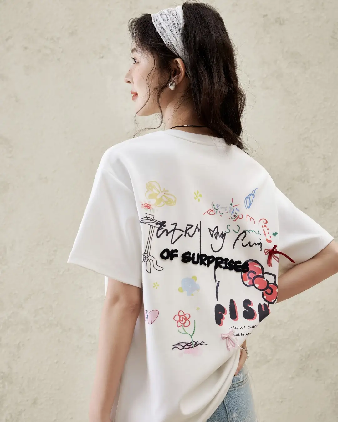 casual summer t-shirt outfit for women 2026 Graphic Back Detail Tee with Playful Artistic Vibe