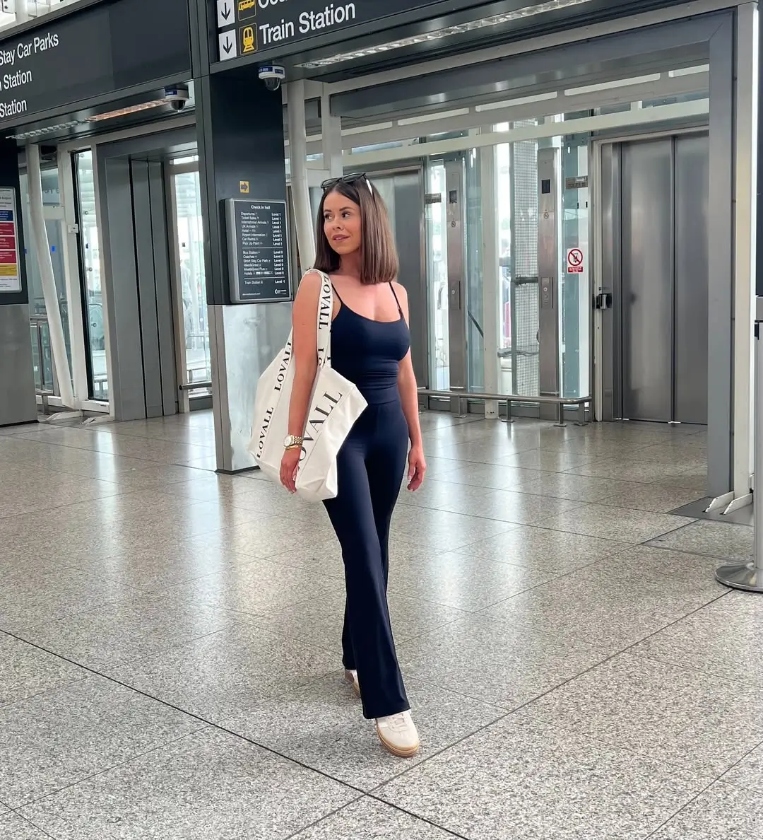 comfy airport outfits summer 2026 Sleek All-Black Jumpsuit That Moves With You