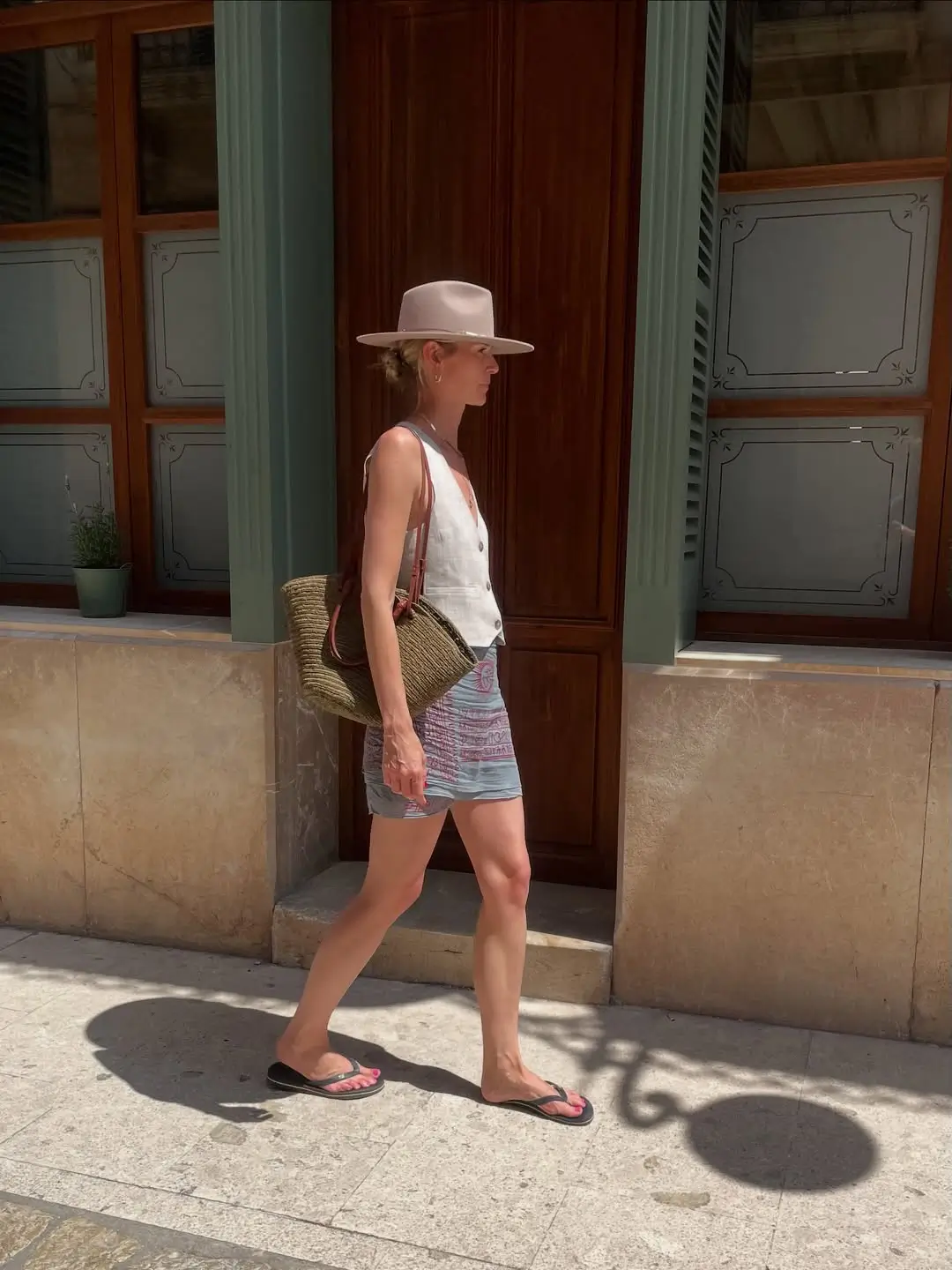 summer outfits women 2026 Minimal Summer Layers with a Light Vest and Shorts