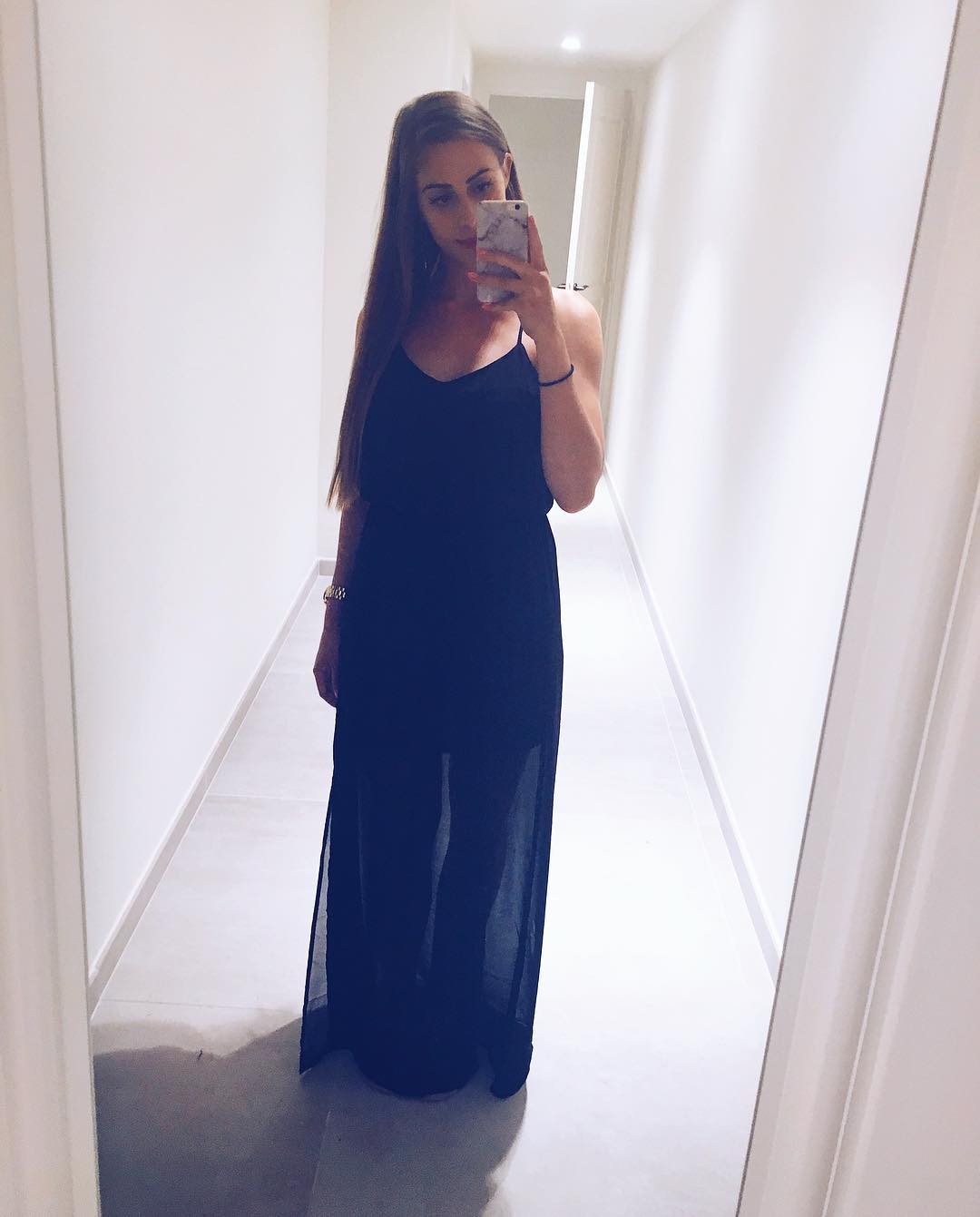summer night going out outfits 2026 Sheer Black Maxi for Understated Evening Elegance