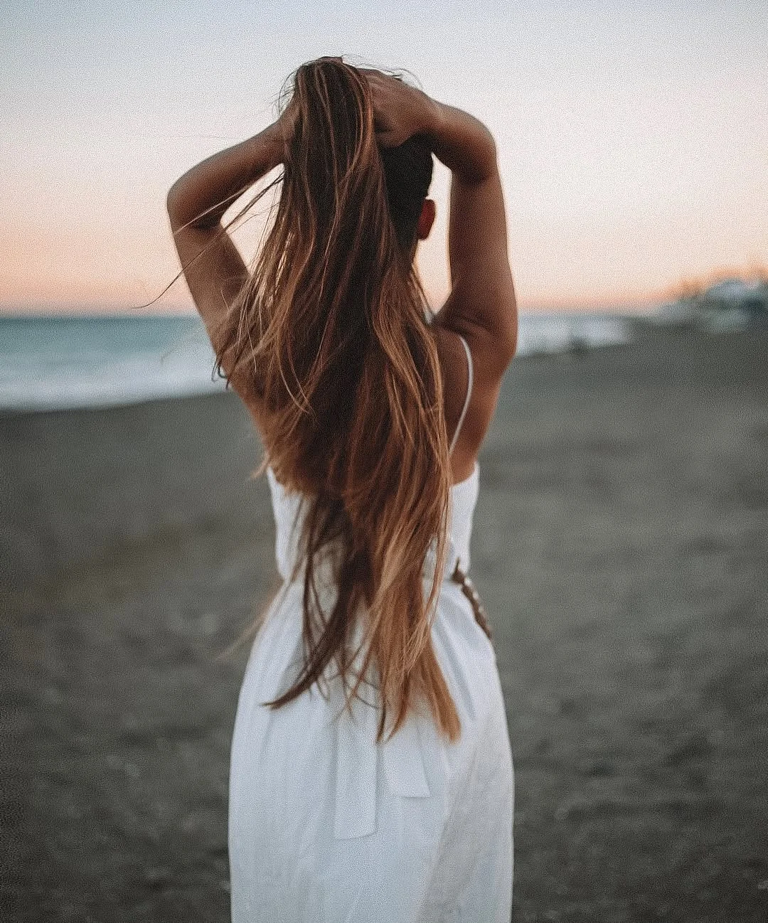 chic summer haircuts for long hair 2026 Beachy Long Layers With Sunlit Balayage