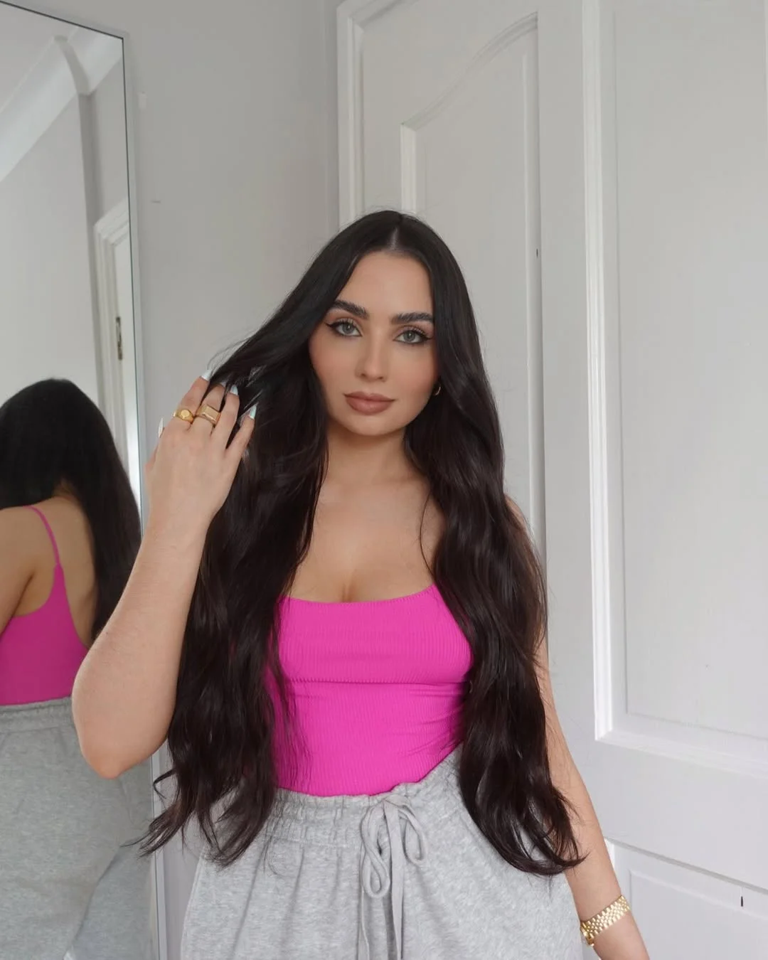 chic summer haircuts for long hair 2026 Dark Romantic Waves With Minimal Layers