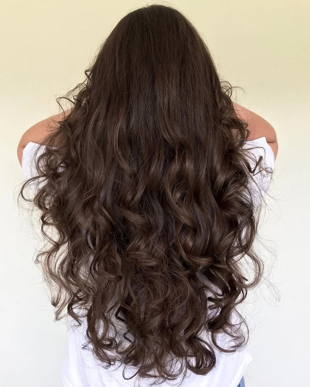 chic summer haircuts for long hair 2026 Romantic Long Curls With Soft Chocolate Dimension