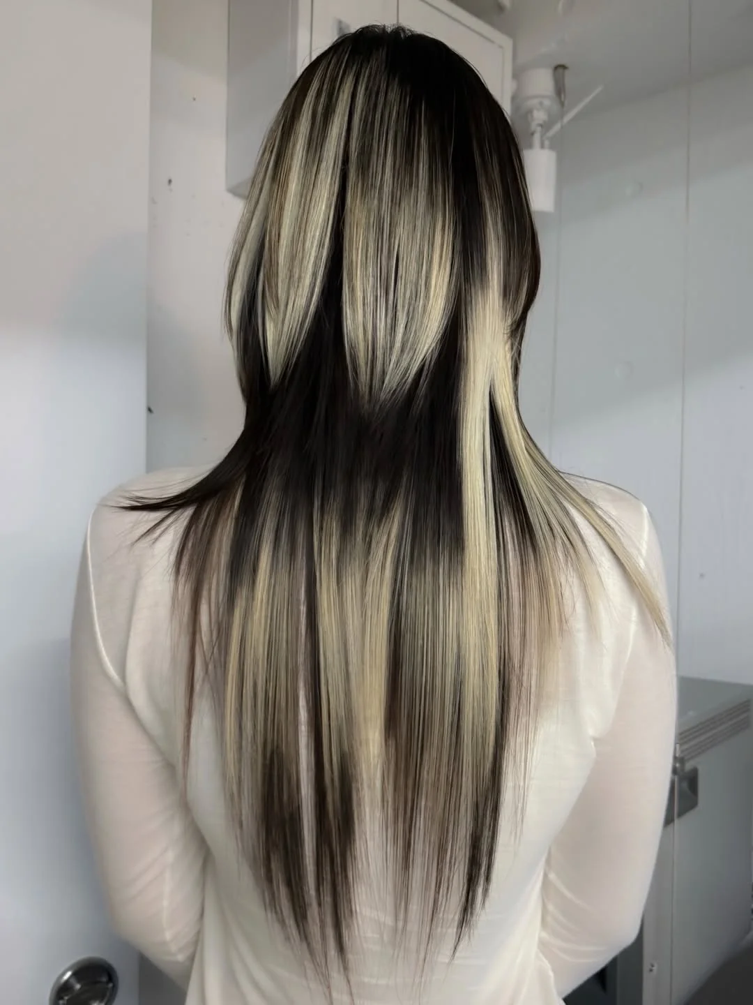 chic summer haircuts for long hair 2026 Sleek Contrast Layers With Ultra-Long Length