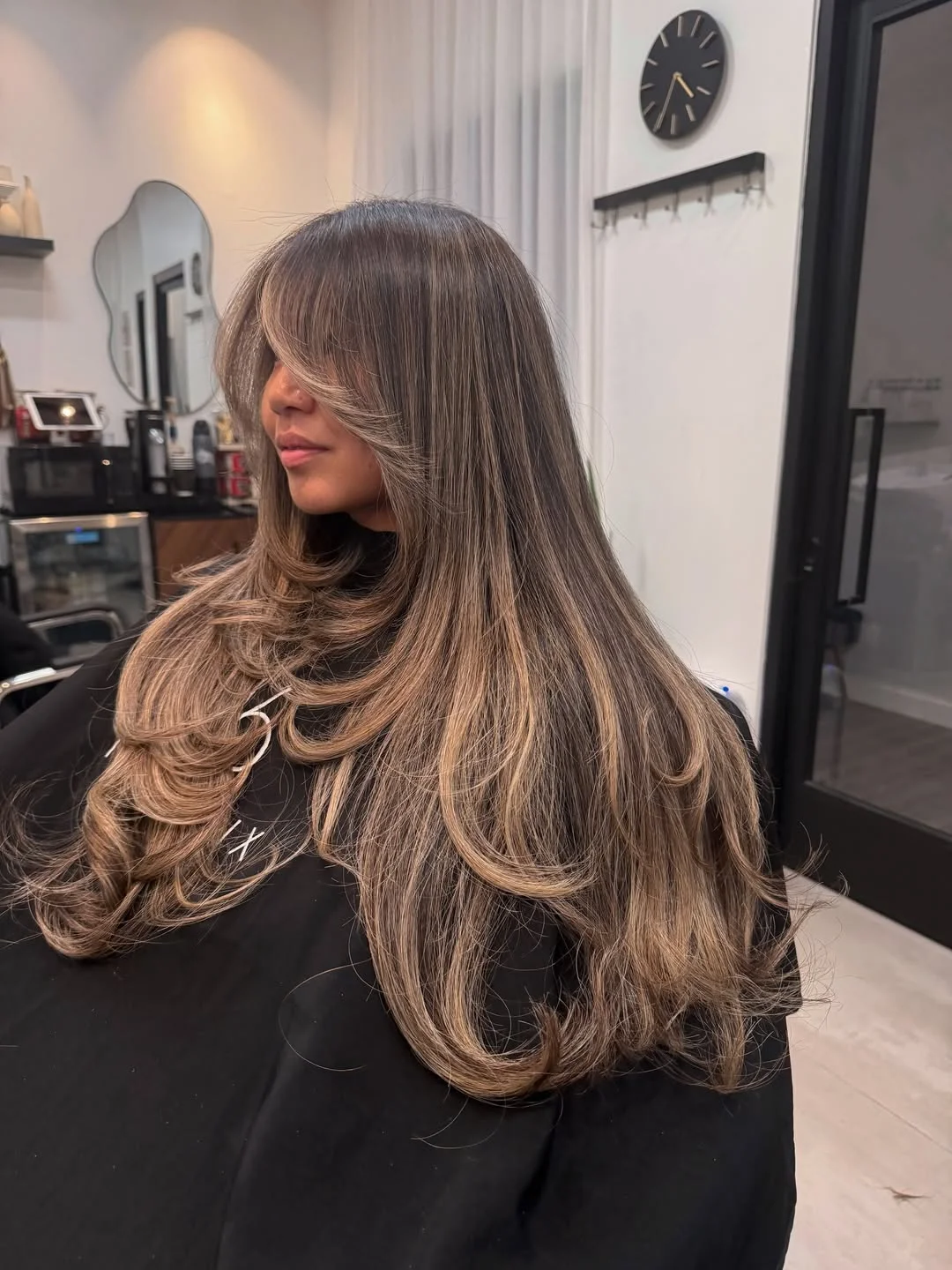 chic summer haircuts for long hair 2026 Long Layered Blowout With Expensive-Looking Dimension