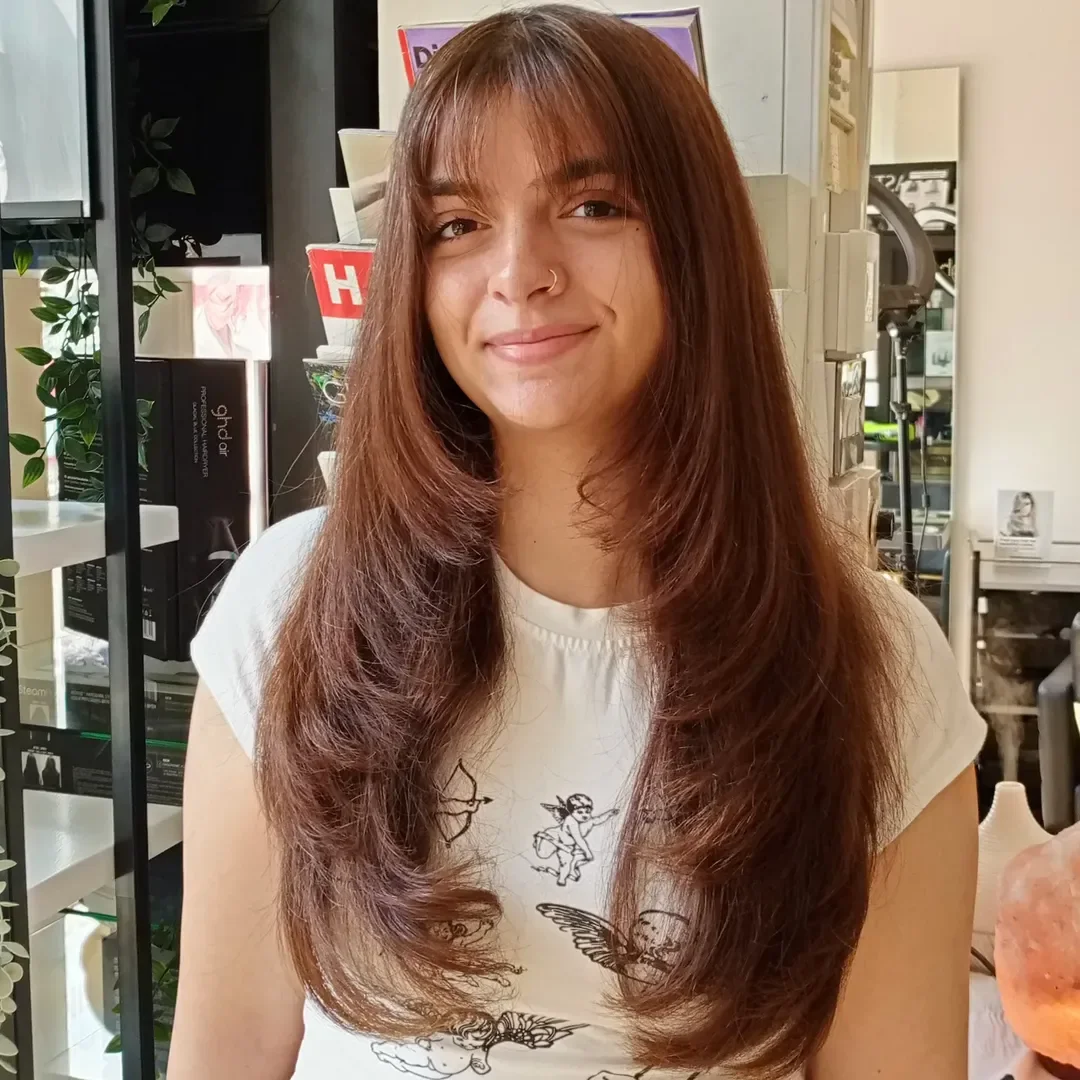 chic summer haircuts for long hair 2026 Chocolate Brown Layers With Airy Curtain Bangs
