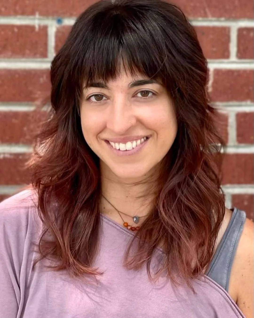 feathered summer haircuts for medium hair 2026 Shaggy Feathered Waves With Effortless Fringe
