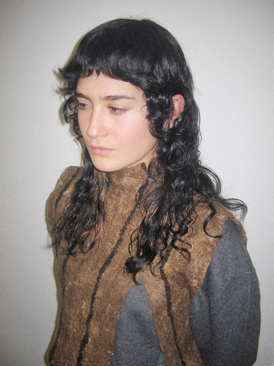 feathered summer haircuts for medium hair 2026 Curly Micro Fringe With Alternative Feather Texture
