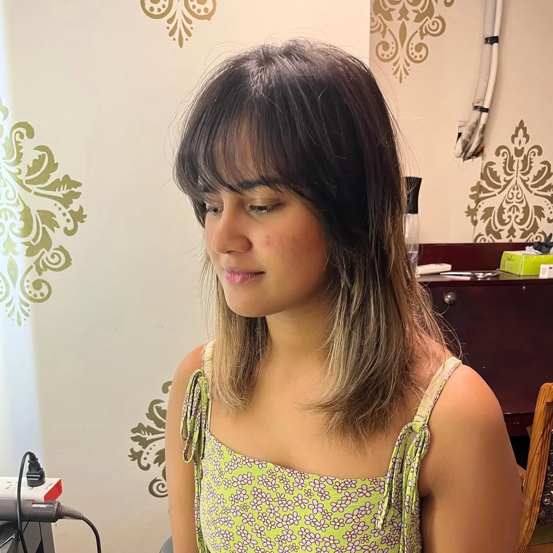 feathered summer haircuts for medium hair 2026 Airy Fringe and Soft Summer Movement
