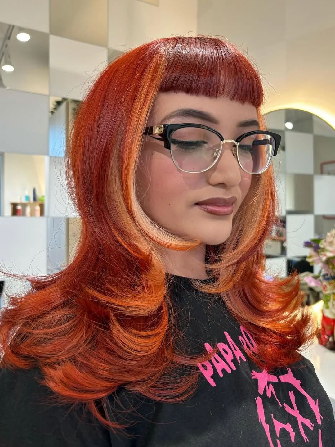 feathered summer haircuts for medium hair 2026 Bold Copper Feathered Layers With Retro Fringe