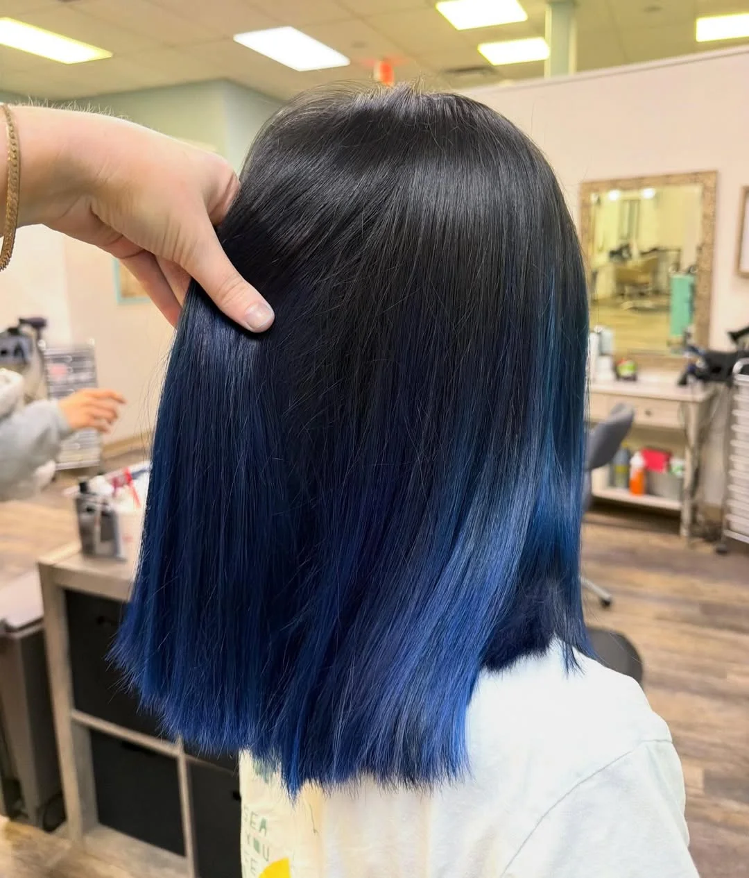 flattering summer ombre hair color 2026 Midnight Blue Melt on Sleek Short Length