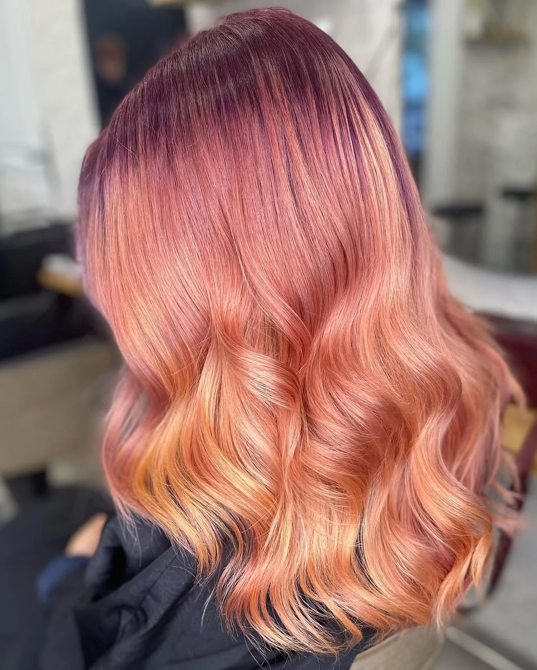 flattering summer ombre hair color 2026 Soft Peach Rose Gradient with Glossy Finish
