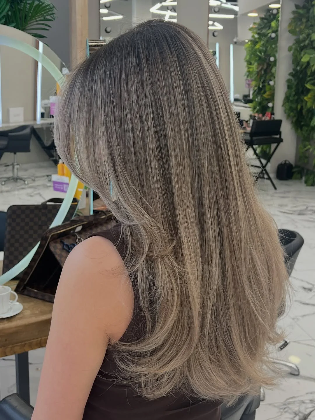 flattering summer ombre hair color 2026 Dimensional Beige Blonde Ombre on Long Layers
