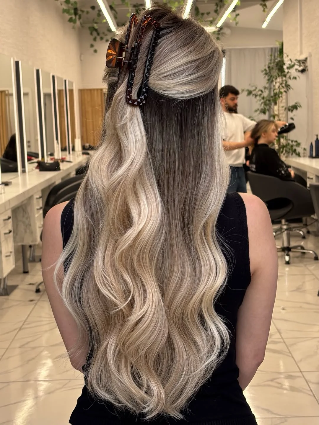 flattering summer ombre hair color 2026 Soft Platinum Melt with Half-Up Styling Detail