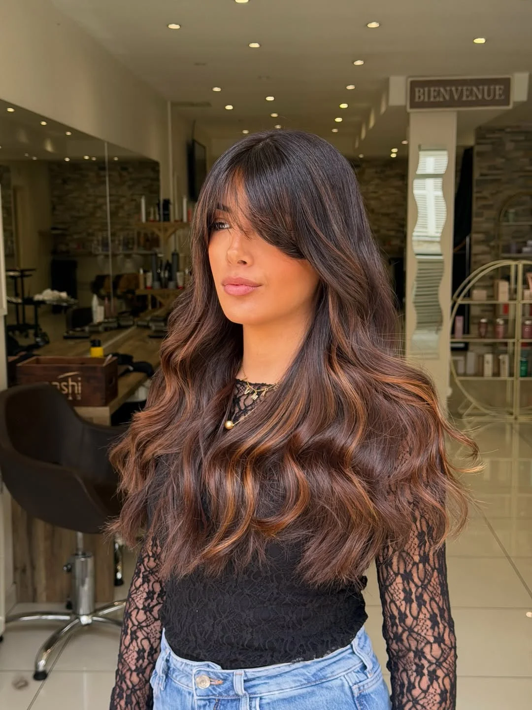 flattering summer ombre hair color 2026 Rich Chocolate Waves with Subtle Copper Dimension