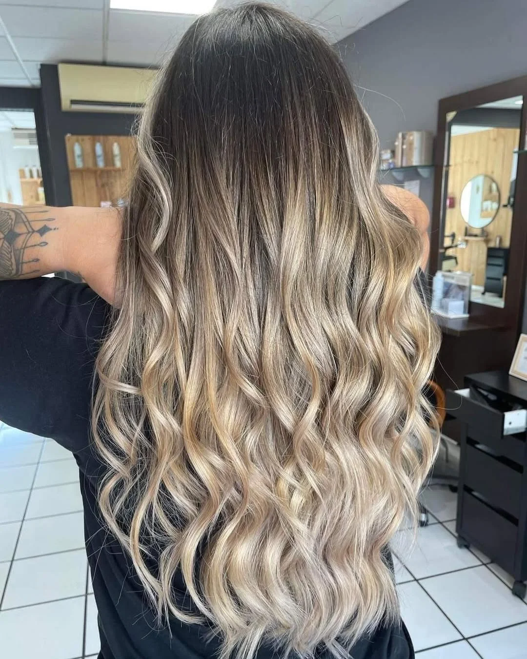 flattering summer ombre hair color 2026 Soft Beige Blonde Ombre with Airy Summer Waves