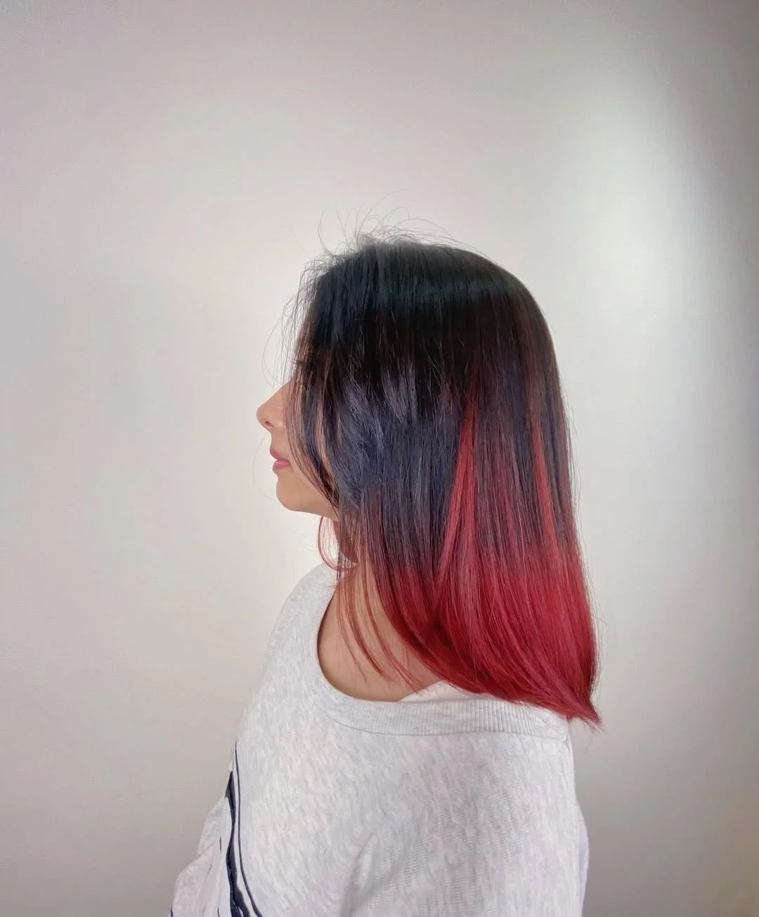 flattering summer ombre hair color 2026 Cherry Red Ombre on Smooth Mid-Length Cut