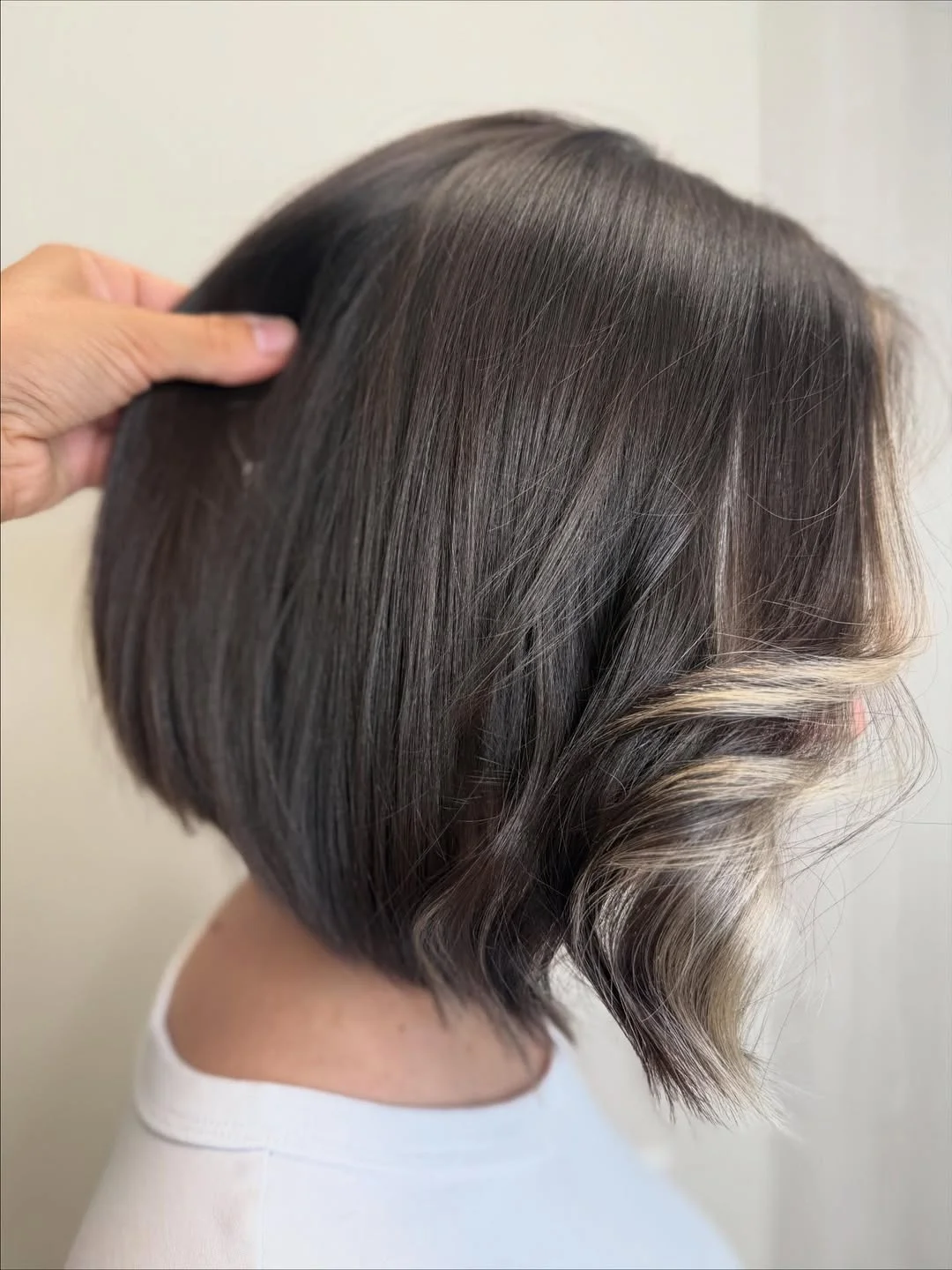 summer bob haircut 2026 Sleek Chocolate Bob with a Hidden Light Play