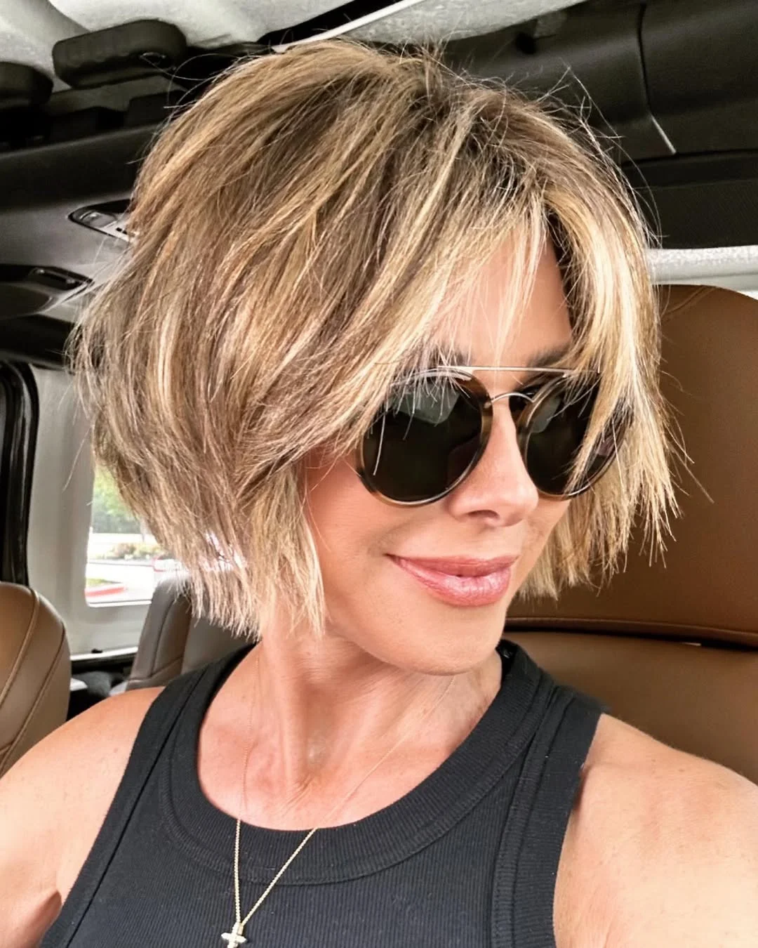 summer bob haircut 2026 Soft Blonde Layered Bob with Airy Movement
