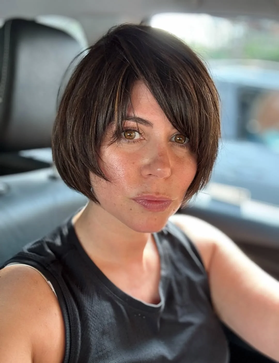 summer bob haircut 2026 Classic Brunette Bob with Side-Swept Bangs