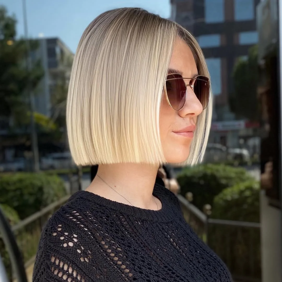 fresh summer haircuts for thin fine hair 2026 Precision Glass Bob With Sharp Minimalist Lines
