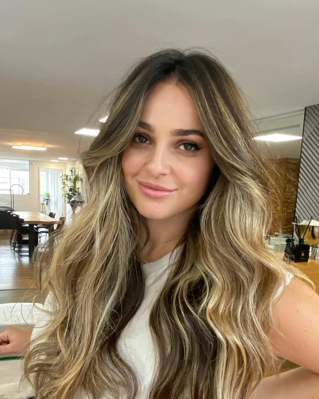 fresh summer haircuts for thin fine hair 2026 Long Espresso Waves With Soft Money-Piece Highlights
