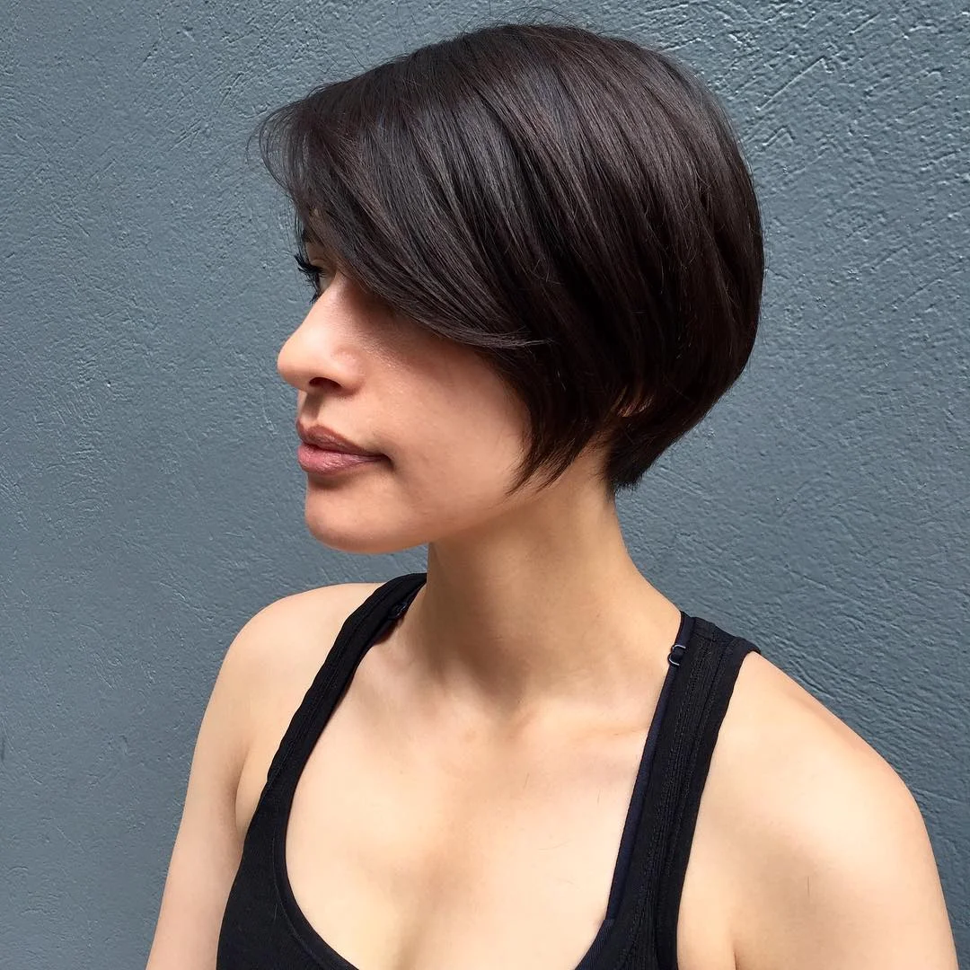 fresh summer haircuts for thin fine hair 2026 Elegant Short Bob With Side-Swept Volume