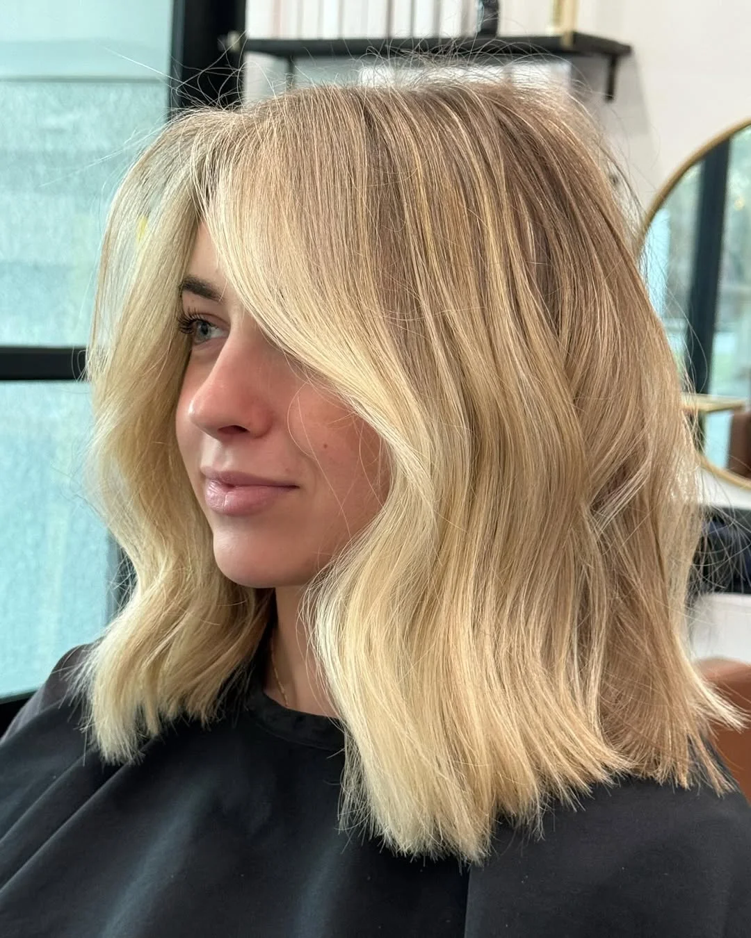 glossy summer blonde hair color 2026 Soft Golden Beige Waves with Natural Volume