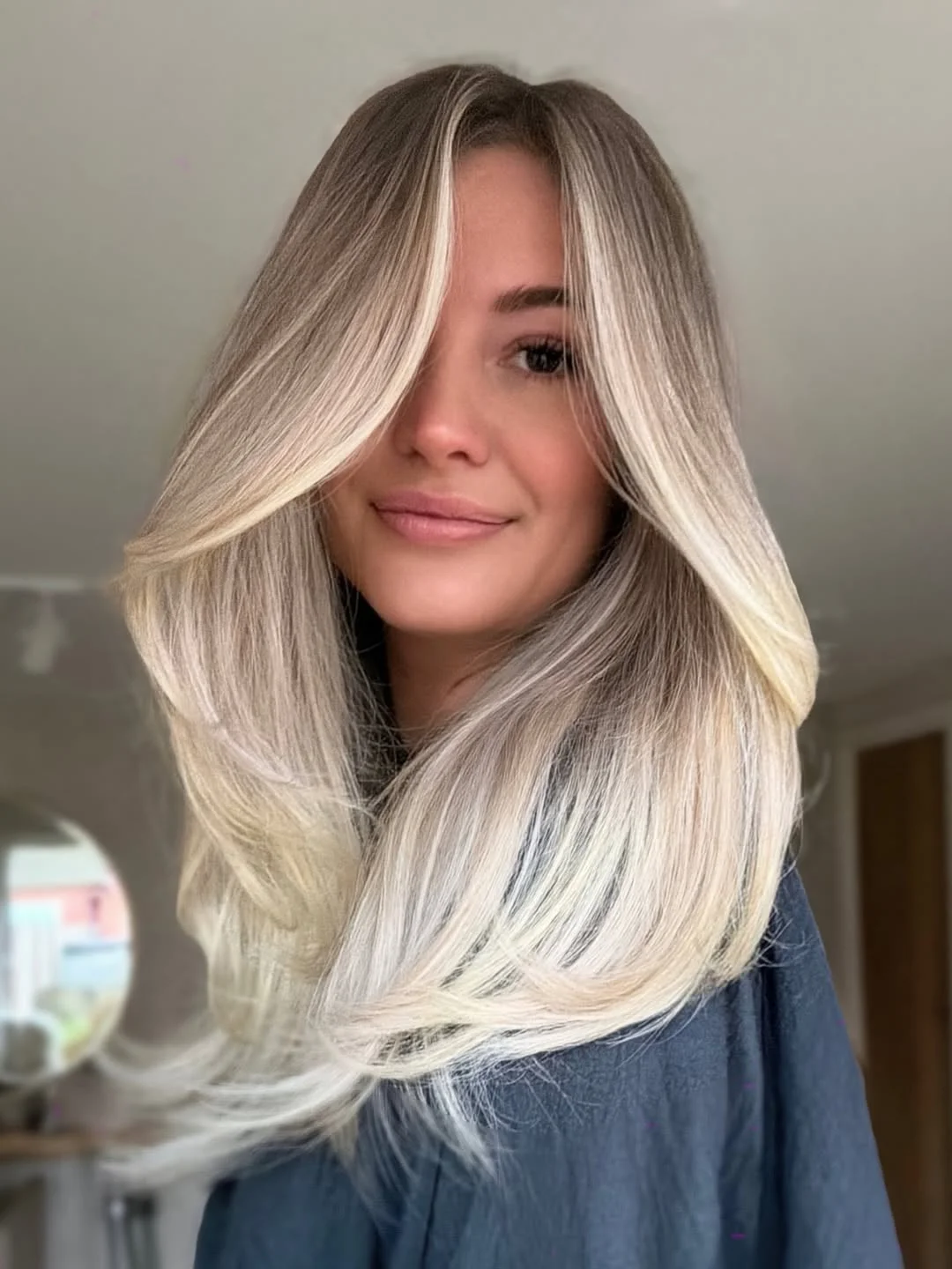 glossy summer blonde hair color 2026 Silky Champagne Blonde with Sculpted Face Layers