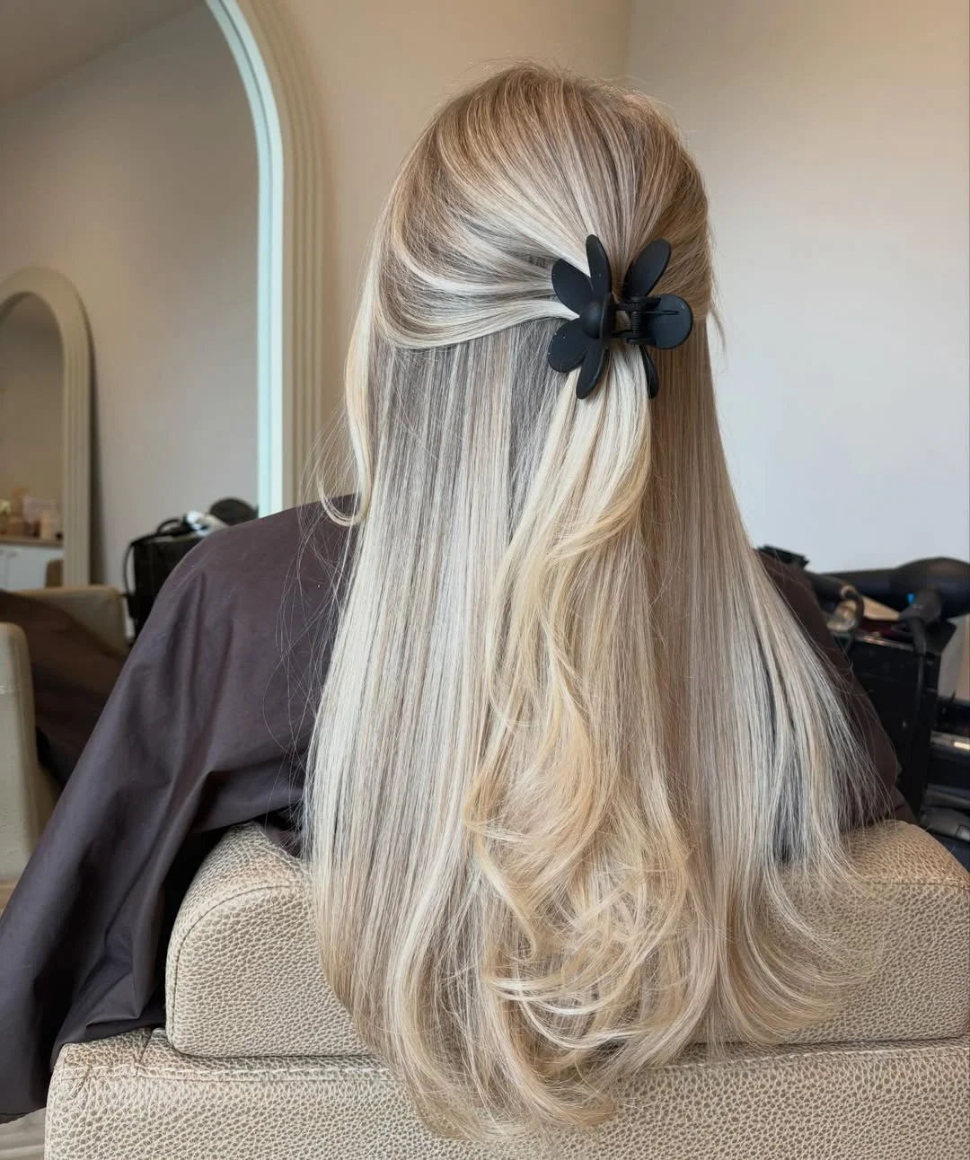 glossy summer blonde hair color 2026 Soft Blended Blonde Lengths with Subtle Clip Styling
