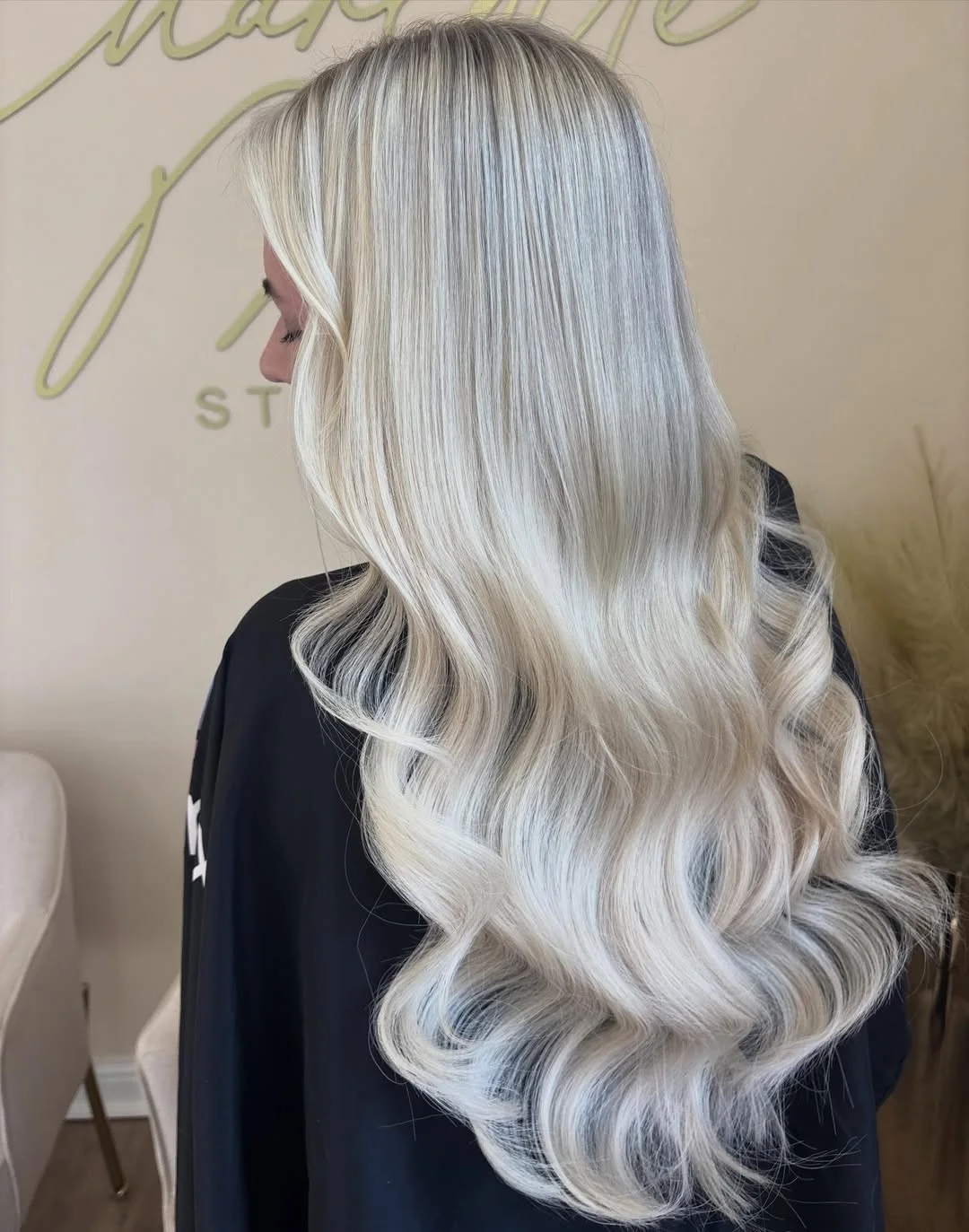 glossy summer blonde hair color 2026 Ultra Gloss Platinum Waves with Cool Dimension