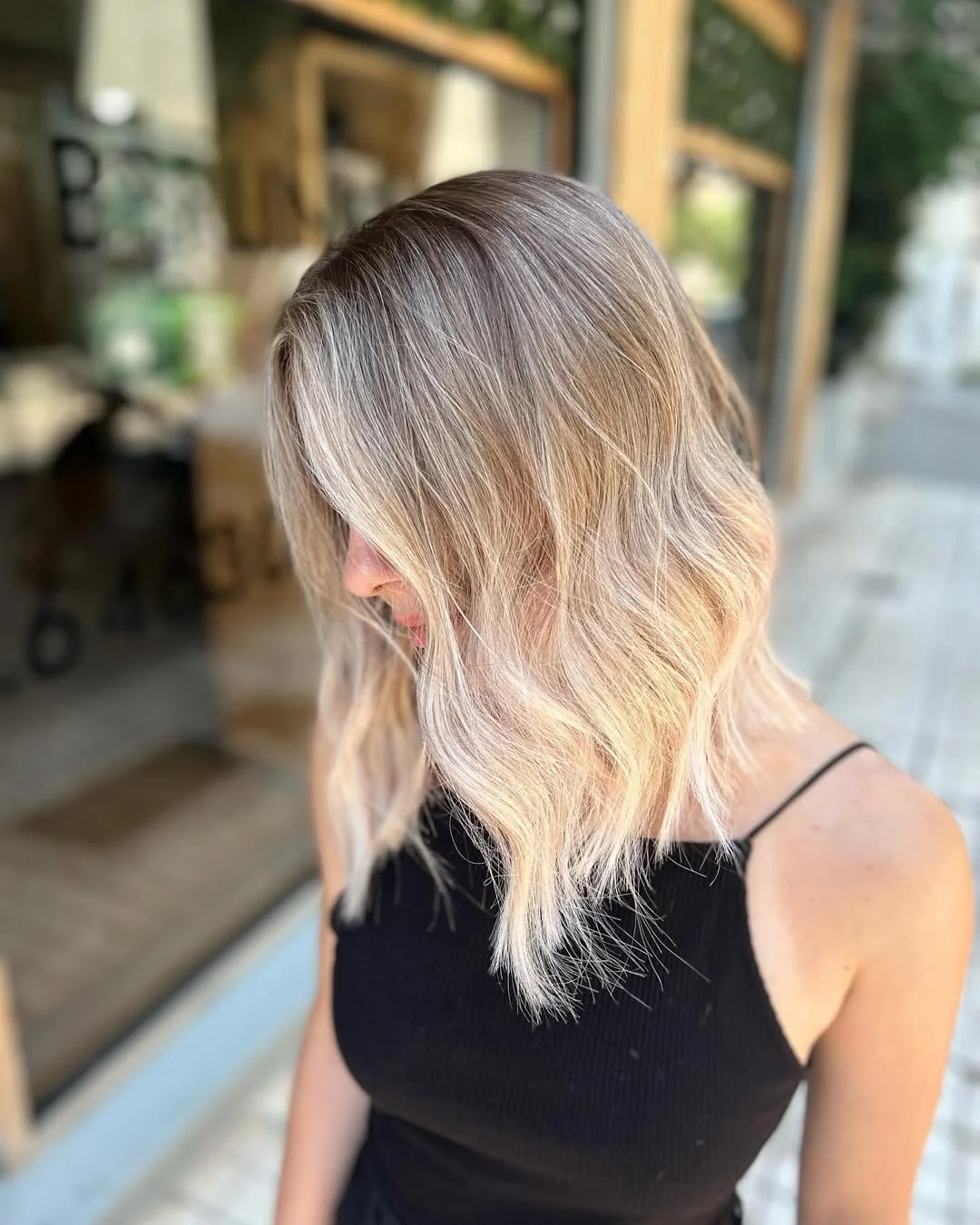 glossy summer blonde hair color 2026 Soft Beige Blonde Waves with Lived-In Texture