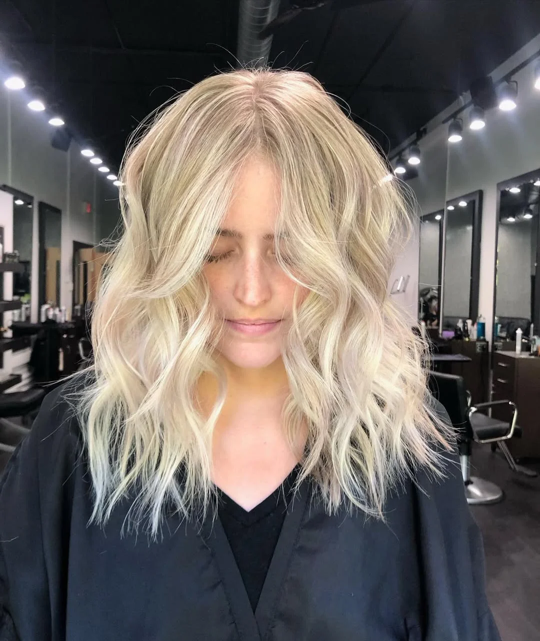 glossy summer blonde hair color 2026 Textured Vanilla Blonde with Soft Volume Layers