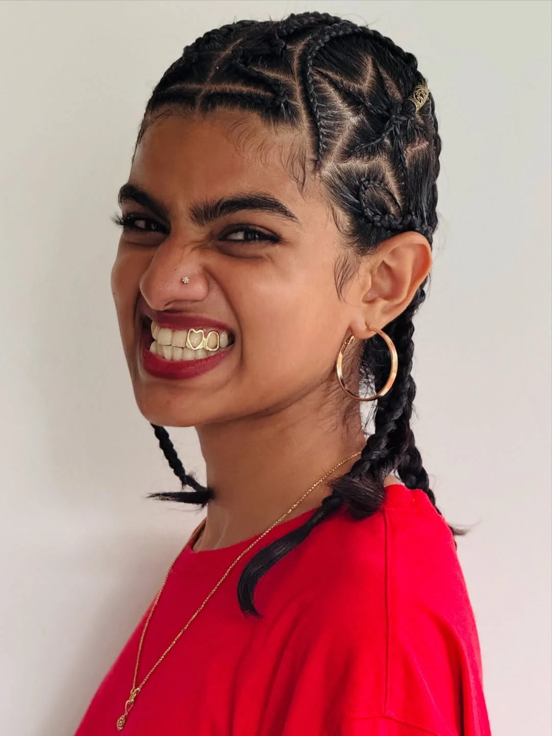 intricate summer braids hairstyle 2026 Geometric Mini Braids With Playful Summer Energy
