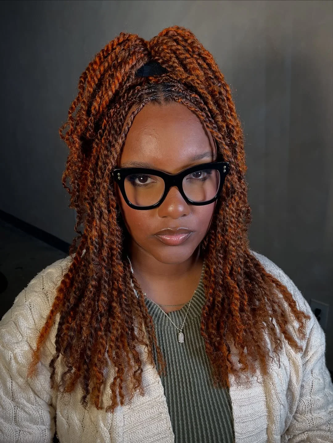 intricate summer braids hairstyle 2026 Half-Up Spring Twists With Rich Cinnamon Dimension
