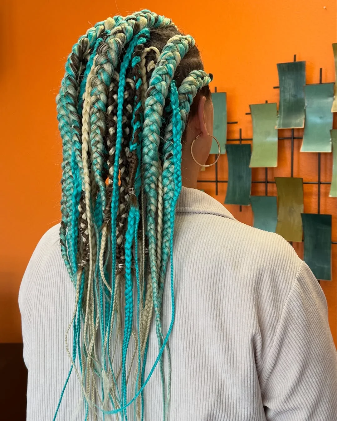 intricate summer braids hairstyle 2026 Turquoise Statement Braids With Festival Color Blocking