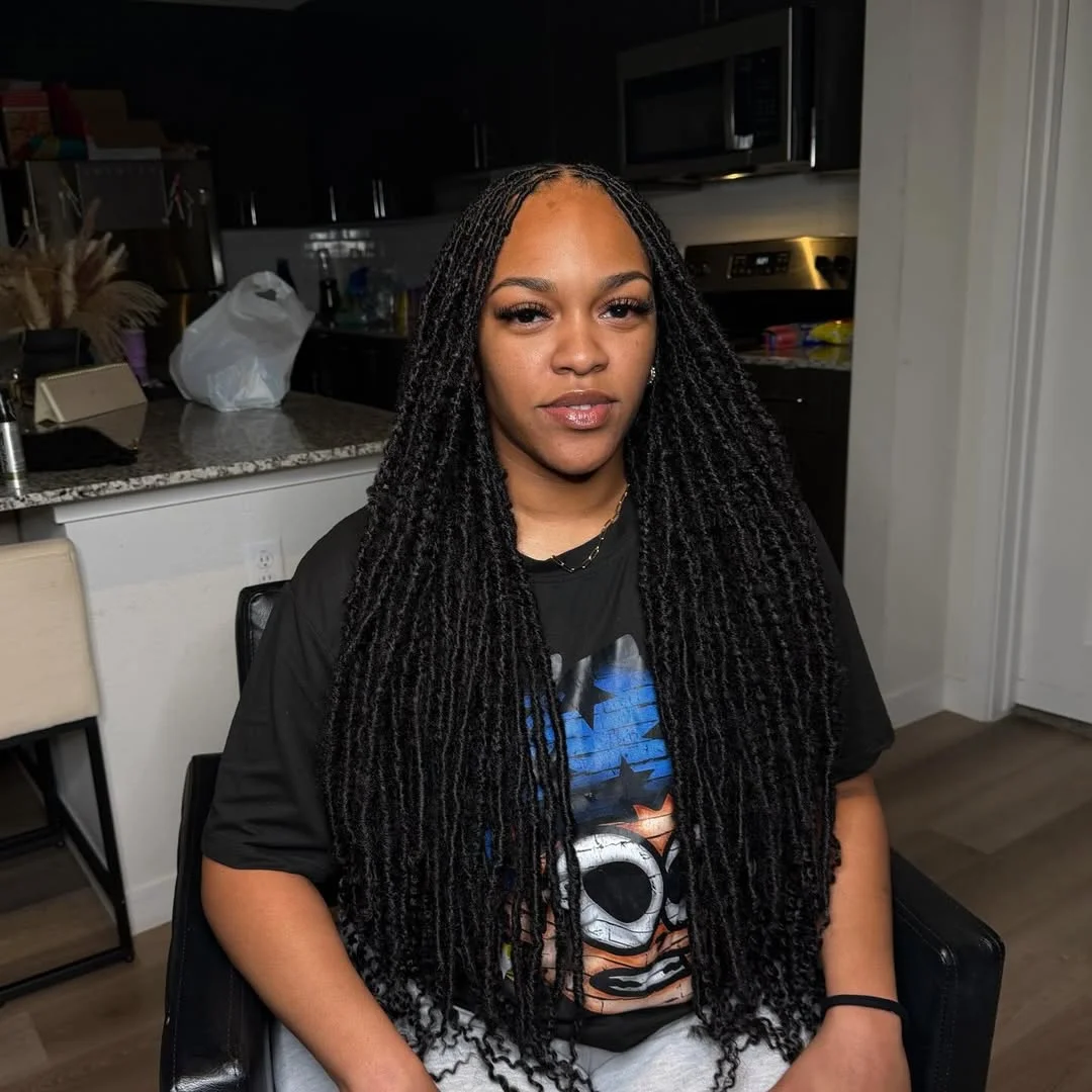 intricate summer braids hairstyle 2026 Soft Black Goddess Locs With Minimalist Finish