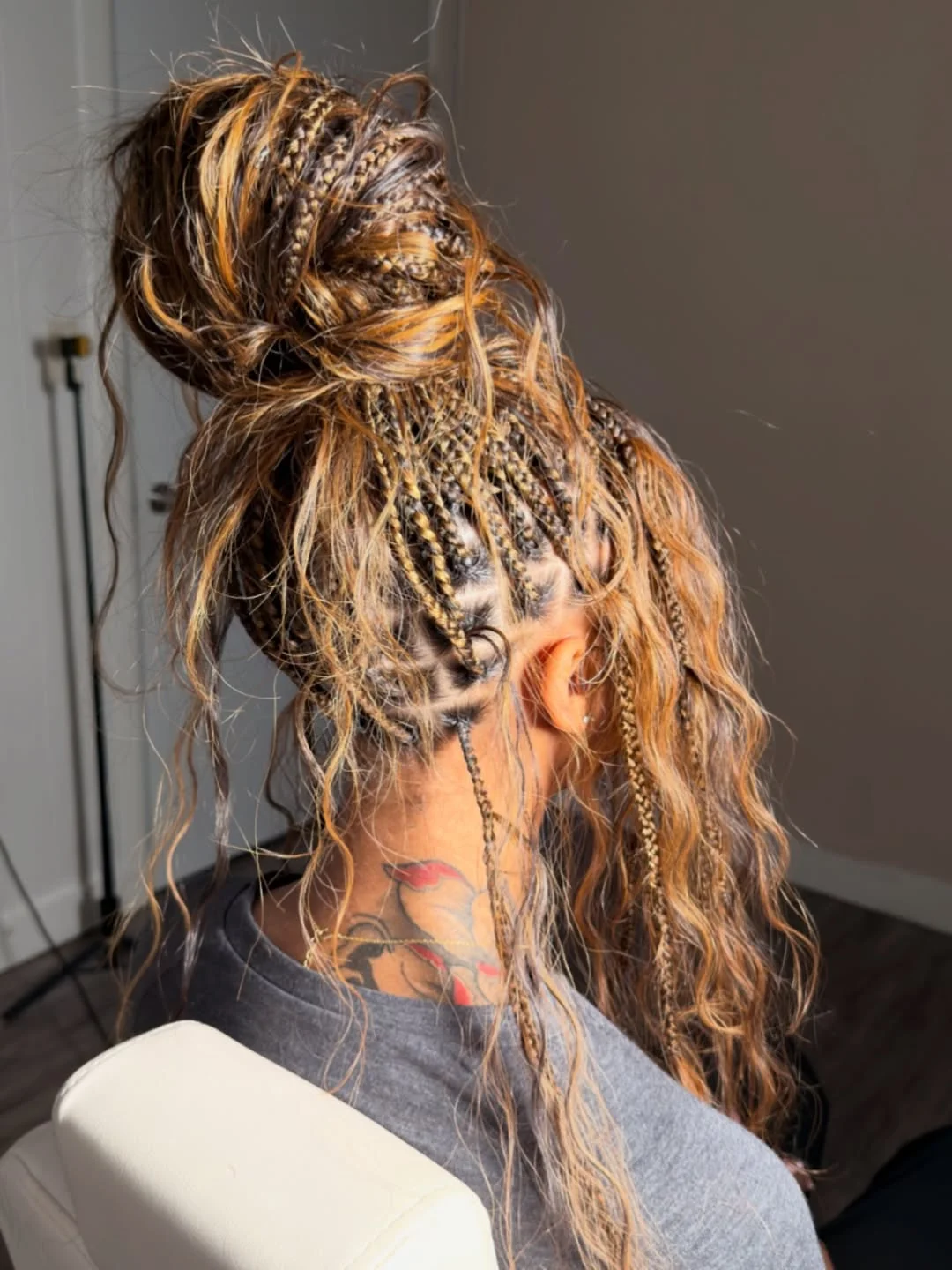 intricate summer braids hairstyle 2026 Bohemian Braided Bun With Golden Ribbons