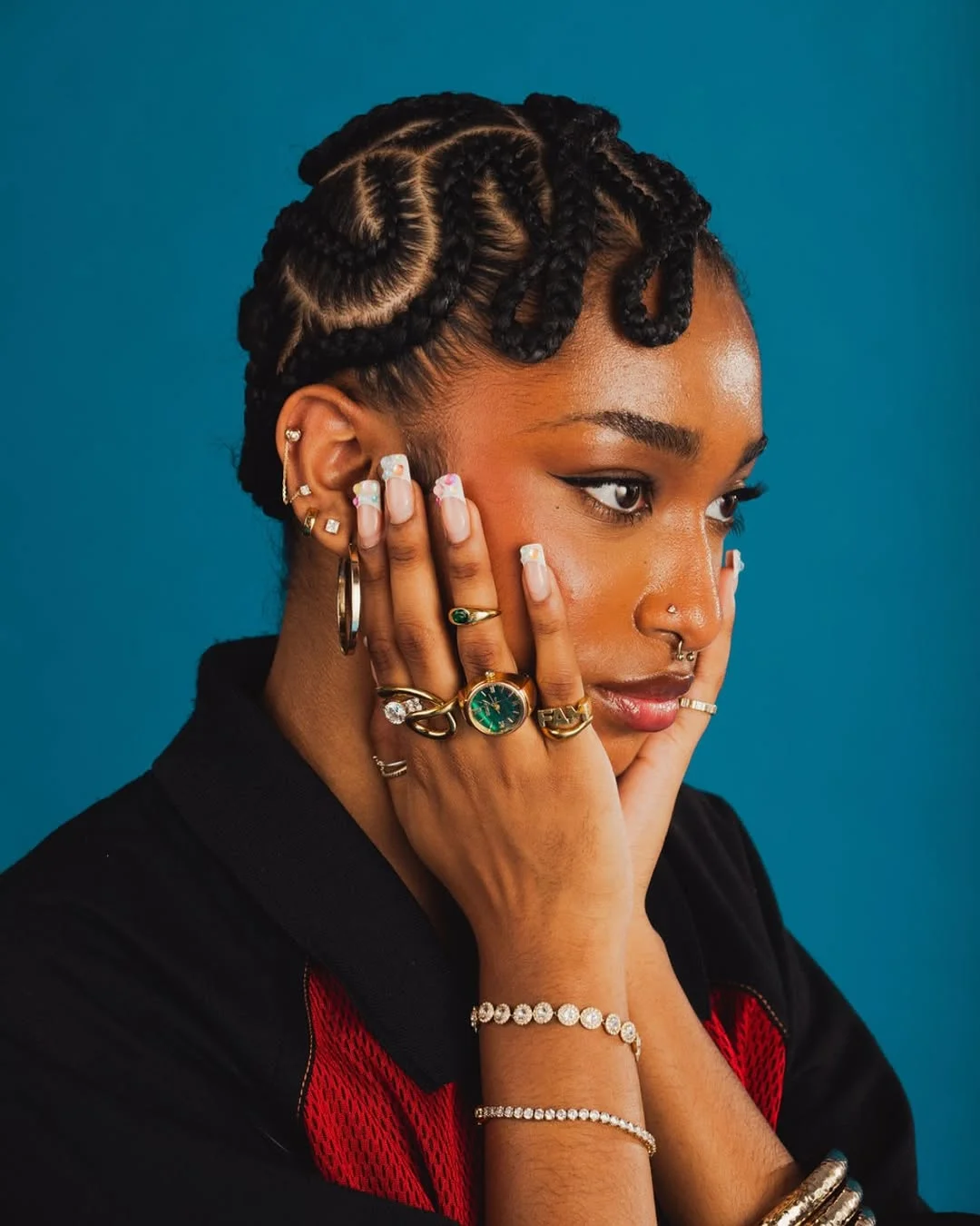 intricate summer braids hairstyle 2026 Sculpted Swirl Cornrows With Editorial Edge