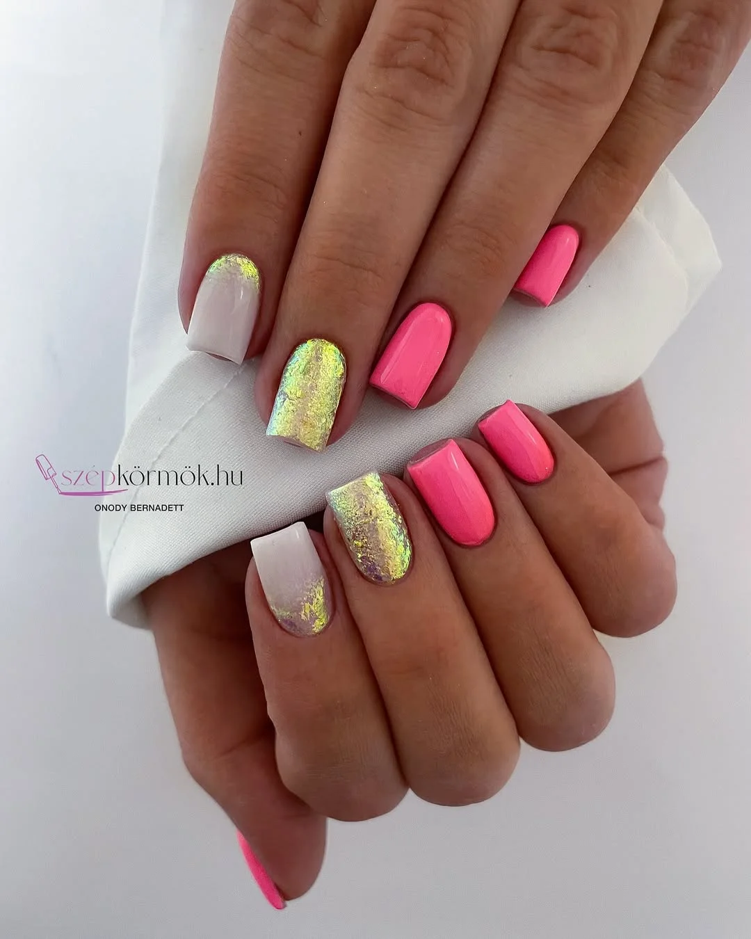 june nail colors 2026 Hot Pink and Gold Foil Nails for Bold Summer Energy