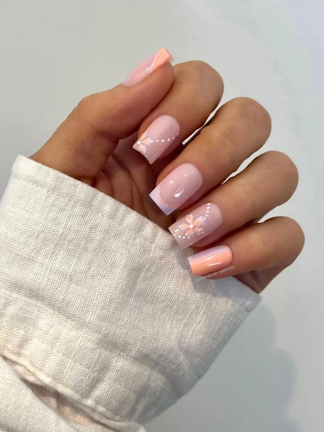 june nail colors 2026 Blush Pink Floral Nails with Delicate Peach Details