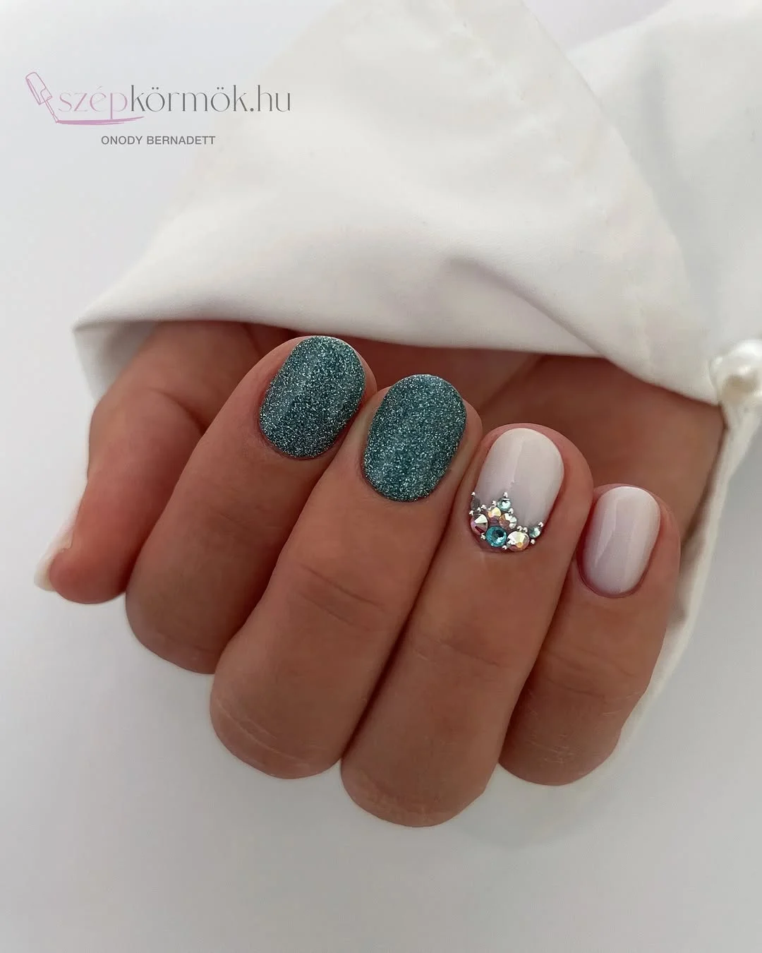 june nail colors 2026 Ocean Sparkle Nails with Minimal Crystal Accents