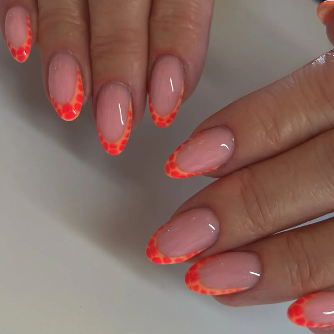 june nail colors 2026 Neon Coral French Tips with Jelly Bubble Texture
