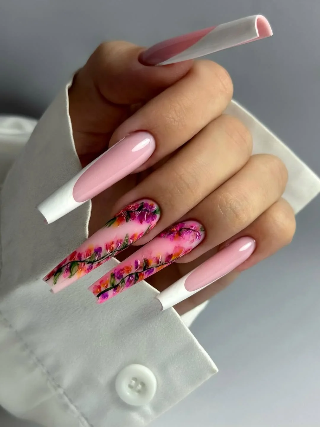 june nail colors 2026 Pink Garden French Tips with Romantic Floral Layers