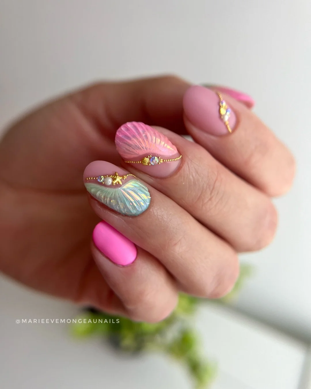 june nails ideas 2026 Mermaid Shell Nails With Glossy Coastal Glam