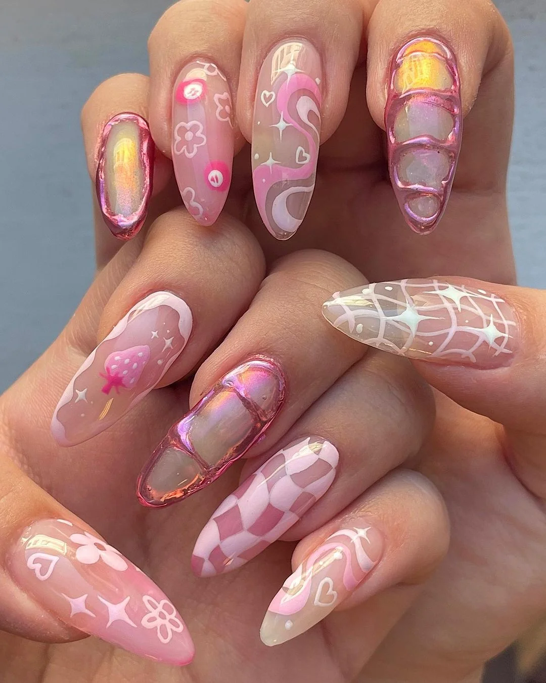 june nails ideas 2026 Glossy Pink Cyber Nails With Playful Y2K Details