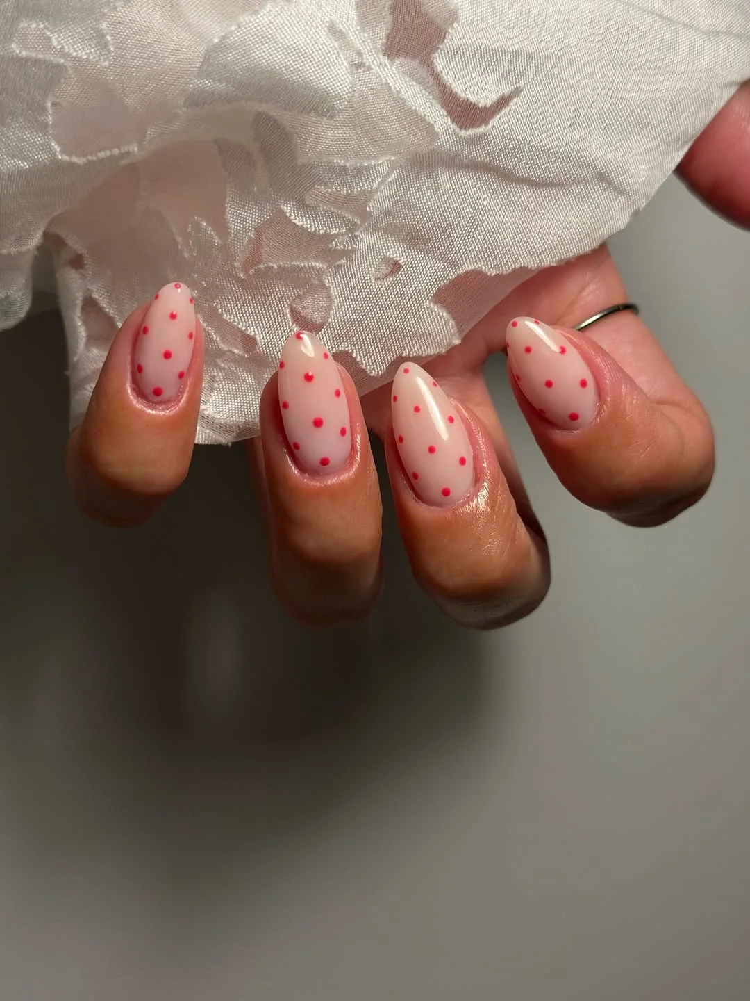 june nails ideas 2026 Milky Pink Polka Dot Nails With Vintage Charm