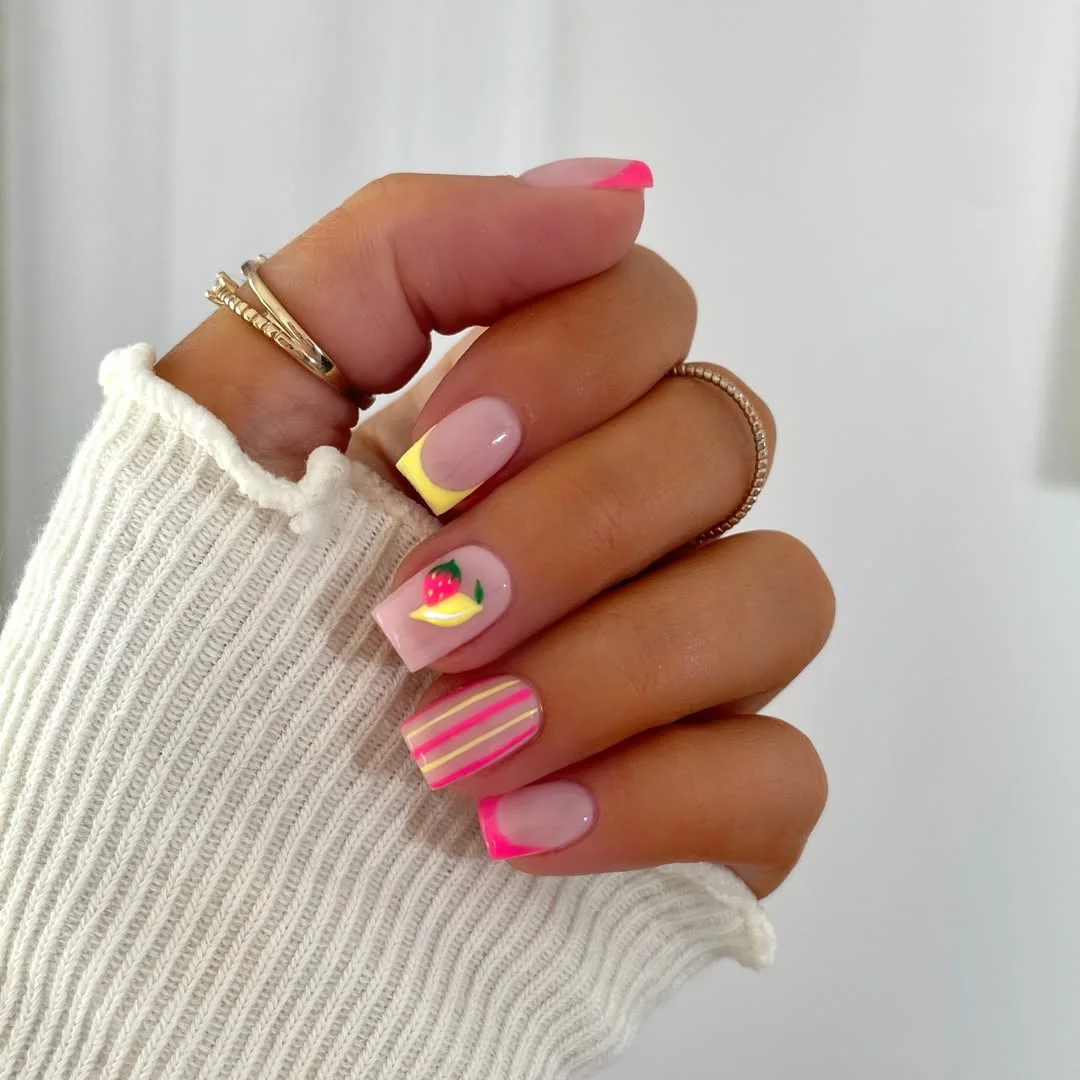 june nails ideas 2026 Bright Fruit-Inspired French Tips With Neon Summer Energy