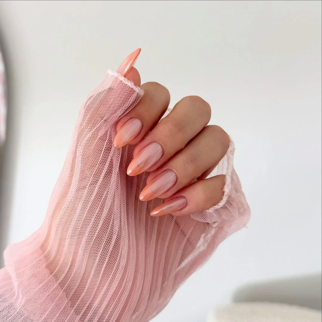 june nails ideas 2026 Peach Glazed Chrome Nails With Sunset Shine